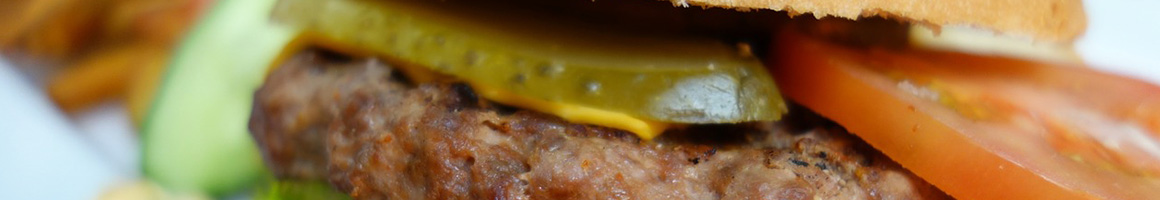 Eating American (Traditional) Burger Hot Dog at Butler Hot Dog Shoppe restaurant in Butler, PA.